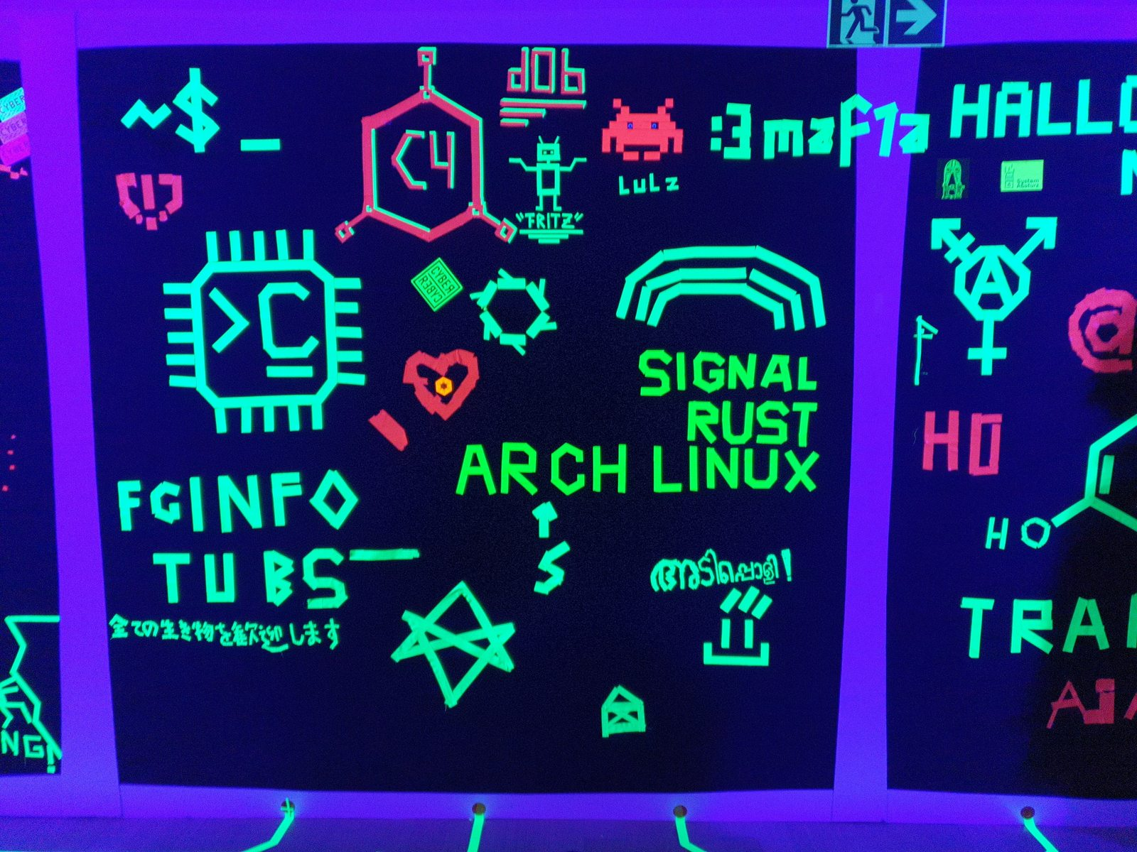 The
wall of fluorescent tapes.